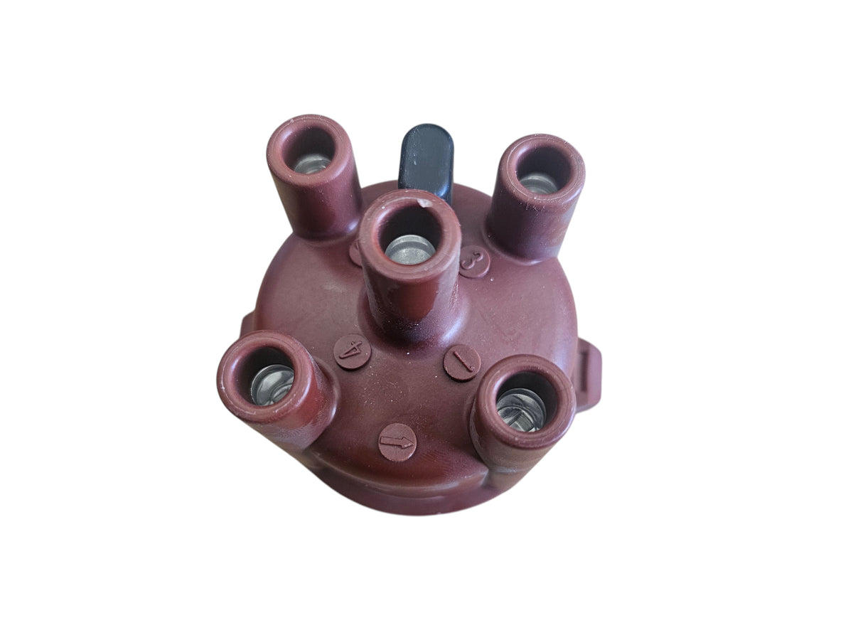 Addicted To Subi brown EA82 Nippon Denso distributor cap with four spark plug wire terminals